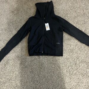 Calvin Klein Performance zip up 
never worn, new with tags.